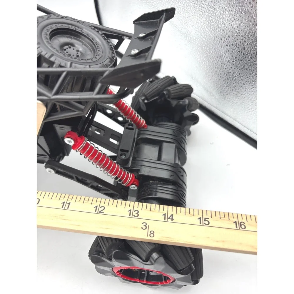 New Bright Slide Winder 4x4 RC Monster Truck Black Red Gold Roll Cage Toy